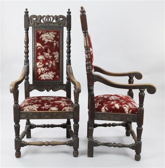 Set 8 Carolean style oak elbow chairs